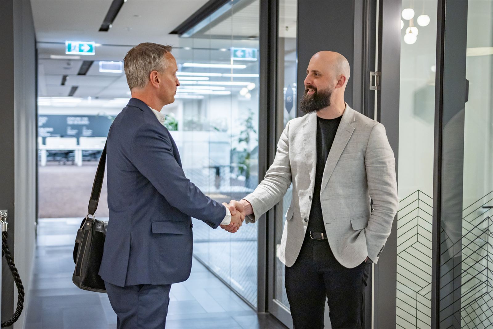Hayden Burt shaking hands with Chris at Professional Bookkeeping Service